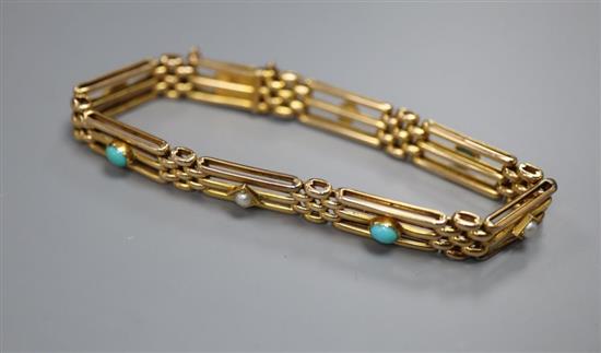 A 15ct gold long gate-link bracelet set with turquoise cabochons and seed pearls, gross 12.7g.
